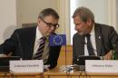 Czech Republic's foreign minister Lubomir Zaoralek talks to EU commissioner for european neighbourhood policy Johannes Hahn during a meeting of Visegrad 4 foreign ministers with their counterparts from six post-Soviet republics in Prague, Czech Republic, Wednesday, May 4, 2016. (AP Photo/Petr David Josek)