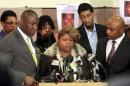File photo of Samaria Rice, the mother of Tamir Rice   along side Benjamin Crump, Leonard Warner and Walter Madison speaks during a news   conference in Cleveland