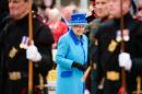 La reine Elizabeth II sourit lors d'une cérémonie à la gare de Tweedbank, à la frontière anglo-ecossaise, le 9 septembre 2015