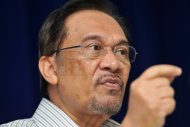 Putrajaya slams Anwar for ‘smear campaign’ against Malaysia