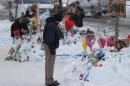 A man looks at the memorial near the site of a fatal   shooting at the Quebec Islamic Cultural Centre in Quebec City