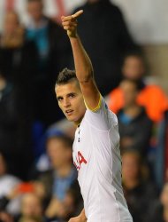 Tottenham's Erik Lamela celebrates scoring his team's third goal during the UEFA Europa League group game against Asteras Tripolis at White Hart Lane in north London, on October 23, 2014