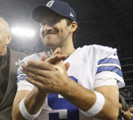 El quarterback Tony Romo de los Cowboys de Dallas tras la victoria ante los Lions de Detroit en los playoffs de la NFL, el domingo 4 de enero de 2015. (AP Foto/Brandon Wade)
