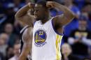 Draymond Green, de los Warriors de Golden State, celebra luego de conseguir un enceste frente a los Spurs de San Antonio, el lunes 25 de enero de 2016 (AP Foto/Marcio José Sánchez)