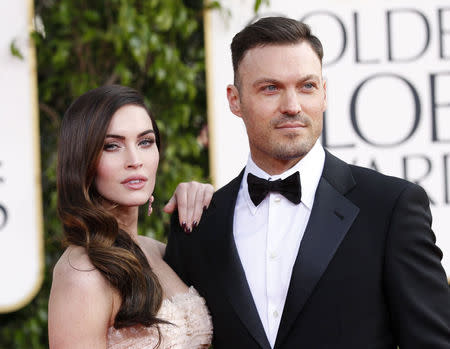 Actor Brian Austin Green and his wife, actress Megan Fox, arrive at the 70th annual Golden Globe Awards in Beverly Hills