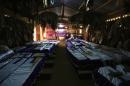 Coffins containing remains of victims of mass   killings during the 1994 genocide are displayed in a Catholic Church in Nyamata