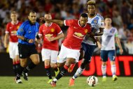 Manchester United's Nani vies for the ball with Michael Keane of the LA Galaxyduring their match in Pasadena, California, on July 23, 2014