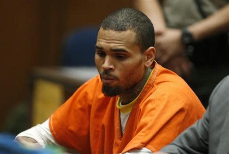 R&B singer Chris Brown, who pleaded guilty to assaulting his girlfriend Rihanna, appears in court in Los Angeles