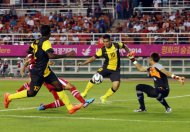 National Under-23 coach Datuk Ong Kim Swee played his trump cards – skipper Aidil Zafuan Abdul Radzak and Gary Steven Robbats – as Malaysia brushed aside Laos 4-0 in a vital Group A match at the Ansan Wa Stadium to stay alive in the 17th Asian Games football competition on Wednesday. Fittingly Aidil got his