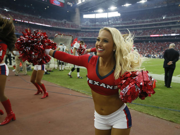 The Houston Texans cheerleaders perform during the fourth quarter of an NFL football game, Sunday, Nov. 2, 2014, in Houston. The Eagles won 32-21. (AP Photo/Tony Gutierrez)