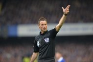 Mark Clattenburg in action during the Premier League match between Everton and Manchester United at Goodison Park in Liverpool on April 20, 2014