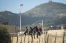 Un centenar de inmigrantes entran en Melilla en un salto a la valla fronteriza