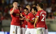 Manchester United players celebrate with goalscorer Reece James (center) after they beat LA Galaxy 7-0 in Pasadena, California, on July 23, 2014