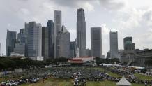 Singapore overwhelmed by huge crowds mourning founding leader Lee.