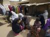 File d'attente devant un bureau de vote à Daura au Nigeria, le 28 mars 2015