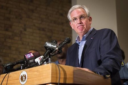 Missouri Governor Jay Nixon declares a state of emergency and curfew in response to looting the previous night in Ferguson, Missouri August 16, 2014. REUTERS/Lucas Jackson