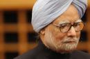 Indian Prime Minister Manmohan Singh walks into room   to deliver his speech at hotel in Tokyo