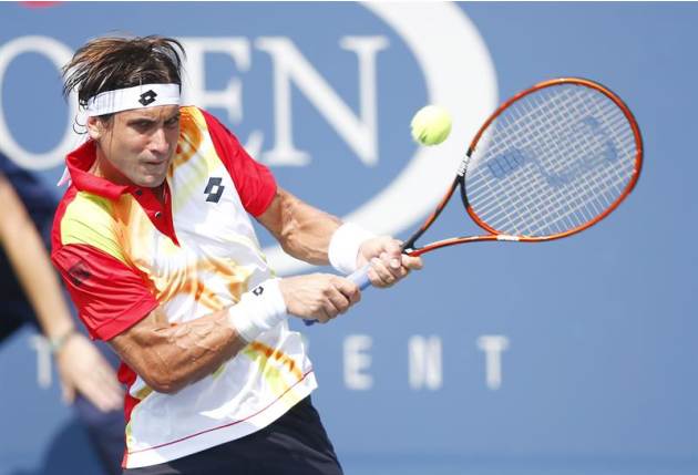 AHG. Flushing Meadows (United States), 31/08/2014.- David Ferrer of Spain hits a return to Gilles Simon of France during the seventh day of the 2014 US Open Tennis Championship at the USTA National Te