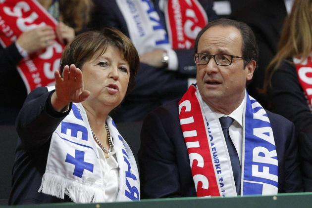 Martine Aubry et François Hollande, dans les tribunes du stade Pierre Mauroy le 22 novembre 2014, lors du double de la finale de Coupe Davis opposant la France à la Suisse., Christophe Ena/AP/SIPA