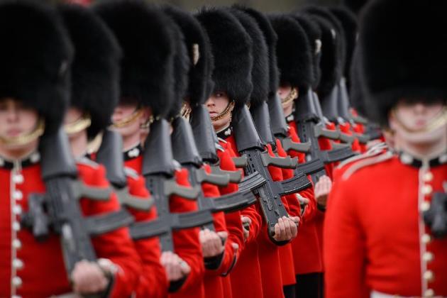 Royal guards, who are soldiers in British cavalry and infantry units, are a popular tourist attraction due to their brightly-coloured uniforms, bearskin hats and gleaming helmets