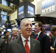 Piero Ferrari, son of Ferrari founder Enzo Ferrari, arrives at the New York Stock Exchange for Ferrari's IPO, Wednesday, Oct. 21, 2015. The parent company, mass-market carmaker Fiat Chrysler Automobiles, is selling shares under the stock name RACE. (AP Photo/Richard Drew)