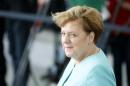 German Chancellor Merkel waits for the arrival of   Portuguese President Rebelo de Sousa upon his arrival at the Chancellery in   Berlin