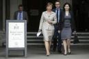 Marina Litvinenko the widow of murdered KGB agent   Alexander Litvinenko and her son leave the High Court in central London