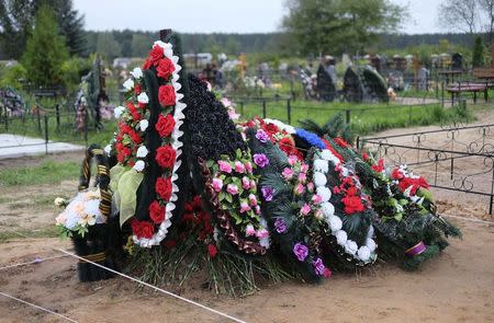 File photo of a freshly dug grave seen at the Vybuty public cemetery in the Pskov region of northwest Russia
