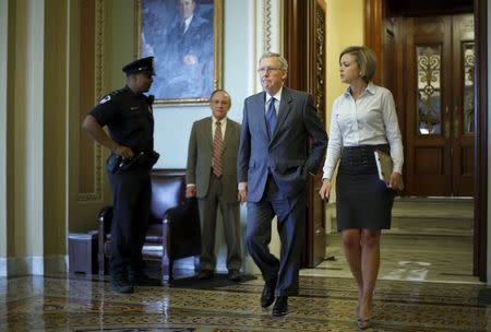 U.S. Senate Majority Leader Mitch McConnell (R-KY) (C) departs the Senate floor after a vote at the U.S. Capitol in Washington May 14, 2015. REUTERS/Jonathan Ernst