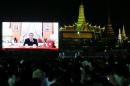 Thailand's new King Maha Vajiralongkorn   Bodindradebayavarangkun is seen on a screen as he delivers a speech to Thais to   celebrate new year at the Sanam Luang park, Bangkok