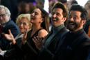 Los actores indios Sonakshi Sinha (i), Hrithik Roshan (c) y Anil Kapoor laugh durante una conferencia de prensa para presentar los premios Oscar de Bollywood en Madrid el 14 de marzo de 2016