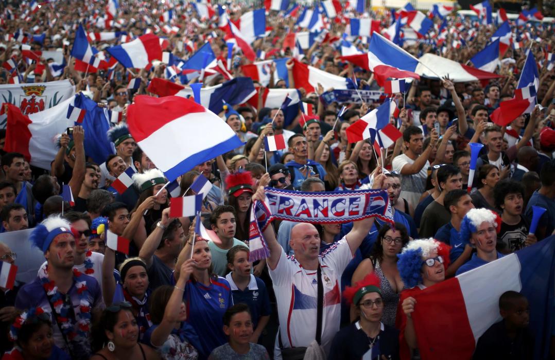 France fans react in the fan zone during a EURO 2016 quarter final soccer match