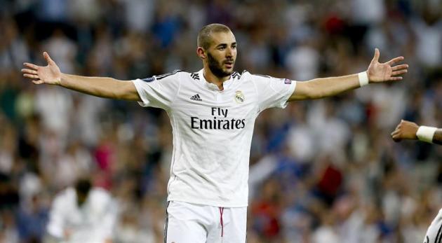 GRA599. MADRID. 16/09/2014.- El delantero francés del Real Madrid Karim Benzemá celebra su gol, quinto del equipo, durante el partido de la primera jornada de la fase de grupos de la Liga de Campeones