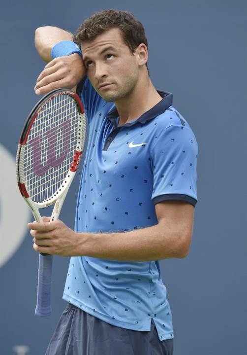 AHG. Flushing Meadows (United States), 02/09/2014.- Grigor Dimitrov of Bulgaria reacts as he plays Gael Monfils of France on the ninth day of the 2014 US Open Tennis Championship at the USTA National 