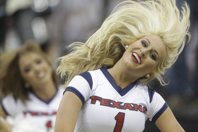 The Houston Texans cheerleaders perform during halftime of an NFL football game Sunday, Sept. 7, 2014, in Houston. (AP Photo/Patric Schneider)