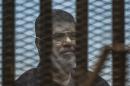 L'ex-président égyptien Mohamed Morsi à l'annonce de sa condamnation à mort le 16 mai 2015 au Caire