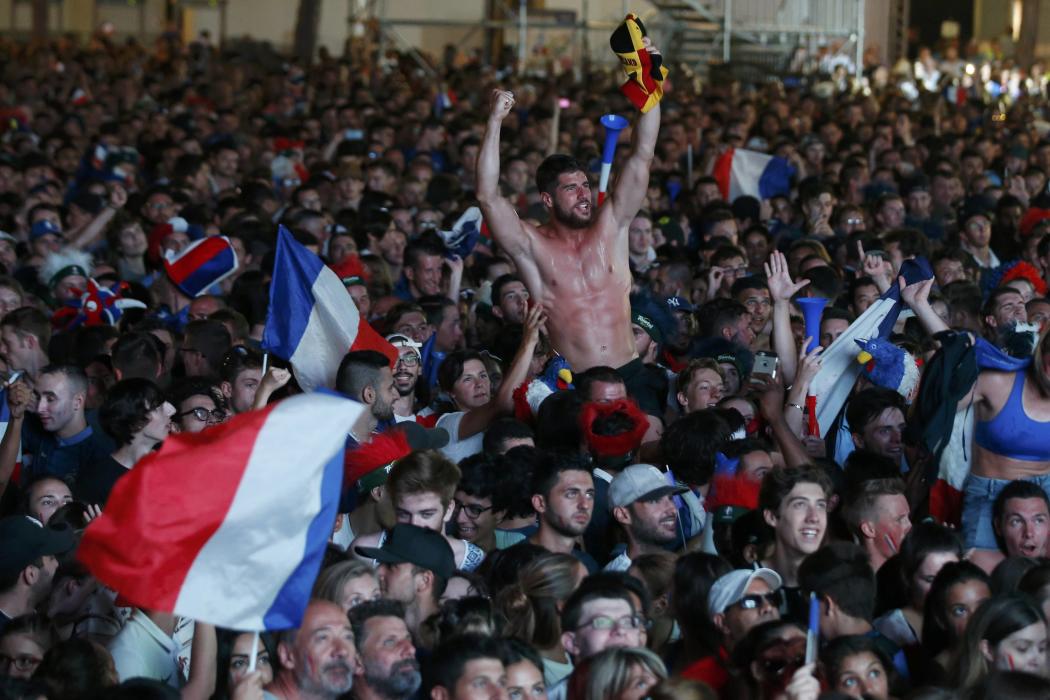 France fans react in the fan zone during a EURO 2016 quarter final soccer match