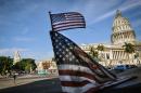 US flags are seen in a bici-taxi near the capitol in Havana on January 23, 2015