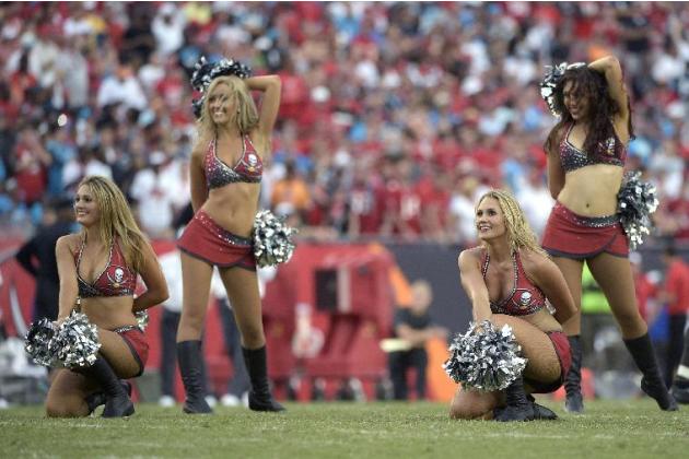 The Tampa Bay Buccaneers cheerleaders perform during the second half of an NFL football game against the Carolina Panthers in Tampa, Fla., Sunday, Sept. 7, 2014.(AP Photo/Phelan M. Ebenhack)