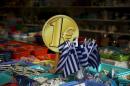 Greek flags are displayed for sale for one Euro at a shop in central in Athens