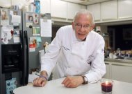 Arnold P. Abbott, president of the Maureen A. Abbott Love Thy Neighbor Fund, Inc., and culinary skills training program, organisations that feed and educate the homeless, poses in the kitchen of his home in Oakland Park, Florida, November 6, 2014. REUTERS/Andrew Innerarity