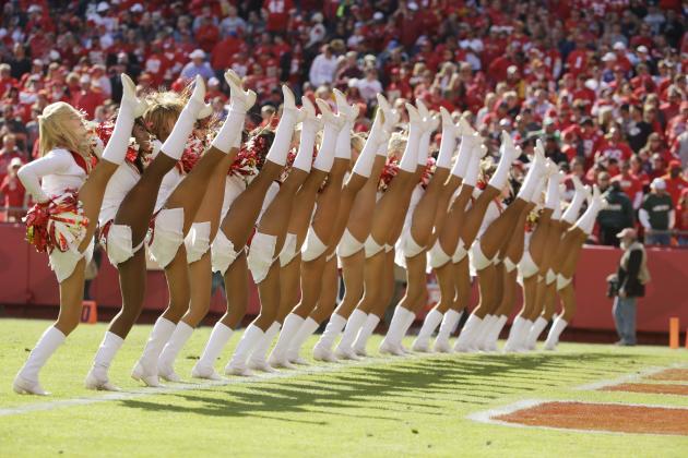 Cheerleaders dance in the first half of an NFL football game between the Kansas City Chiefs and the New York Jets in Kansas City, Mo., Sunday, Nov. 2, 2014. (AP Photo/Charlie Riedel)