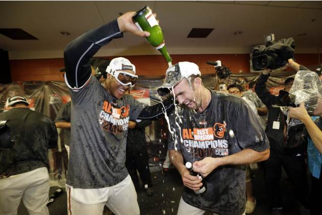 Losers no more, Orioles celebrate AL East title