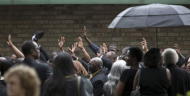 Hundreds mourn black South Carolina man shot in back by police.