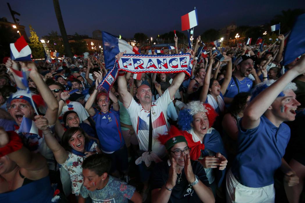 France fans react in the fan zone during a EURO 2016 quarter final soccer match