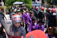 The detained PPS members being escorted from the Beach Street police station to a bus bound for the George Town police headquarters on Jalan Patani August 31, 2014. — Picture by K.E. Ooi