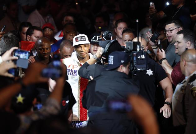 Erislandy Lara, of Cuba, enters the ring prior to is super welterweight fight against Canelo Alvarez, Saturday, July 12, 2014, in Las Vegas