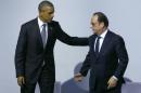 French President Hollande and US President Obama   speak as they attend a meeting to launch the 'Mission Innovation:   Accelerating the Clean Energy Revolution' at the World Climate Change   Conference 2015 (COP21) in Le Bourget