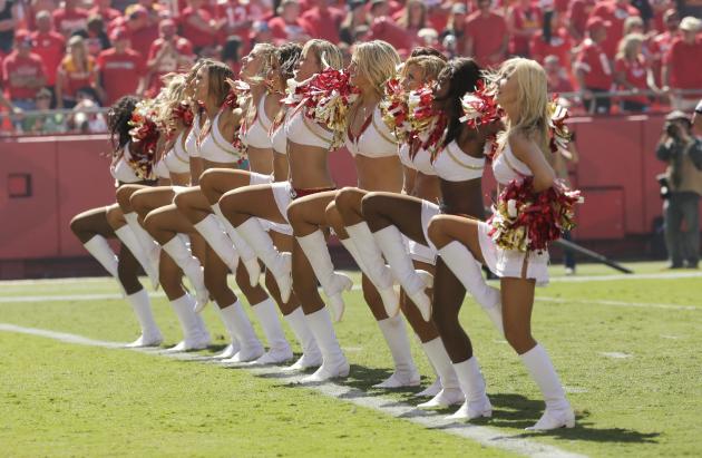 Kansas City Chiefs cheerleaders perform in the second half of an NFL football game between the Chiefs and the Tennessee Titans in Kansas City, Mo., Sunday, Sept. 7, 2014. (AP Photo/Charlie Riedel)