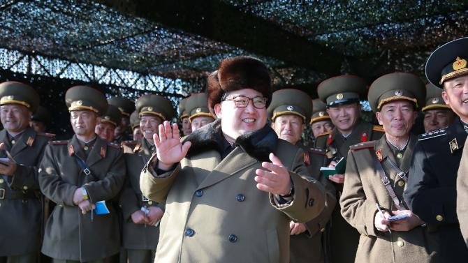 This undated picture released from North Korea&#39;s official Korean Central News Agency (KCNA) on March 11, 2016 shows North Korean leader Kim Jong-Un (C) attending the KPA tank crew competition